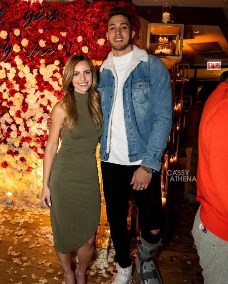 Meyers Leonard in a jeans jacket with wife Elle Bielfeldt.